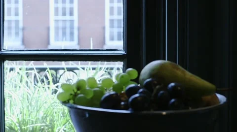 Fruit bowl at window Stock Footage 64263220
