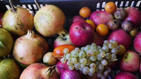 Fruit box full of apples, pomegranates, grapes. Natural fruits Stock Footage 140109988