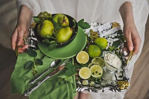 Fruit a Breakfast tray in her hands 8723. Stock Photos