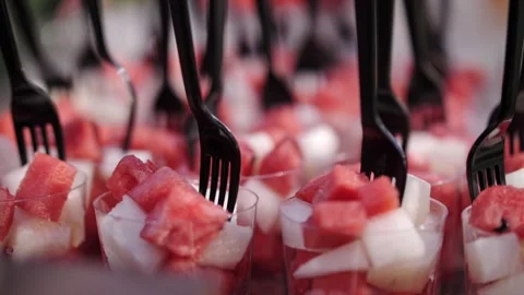 Fruit buffet at the event, black forks in fruit Stock Footage 220423828