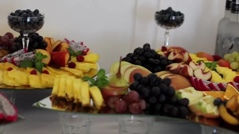 Fruit buffet, many different fruits. A sweet table at a wedding Stock Footage 288482765