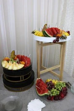 Fruit buffet table: watermelon, grapes, pears. Stock Photos