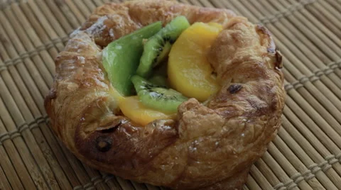 Fruit bun rotating on bamboo background Stock Footage 60942945