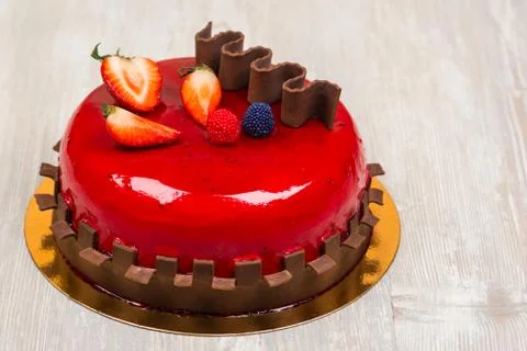 The fruit cake with chocolate on the table Stock Photos