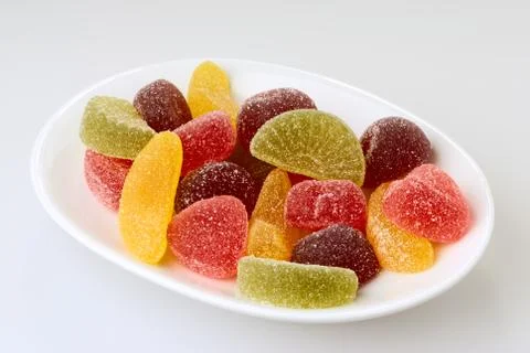Fruit candy on plate Stock Photos