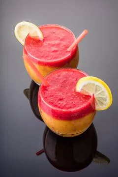 Fruit cocktail peach and raspberry Stock Photos