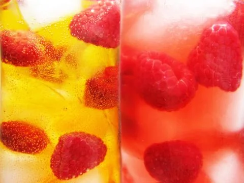 Fruit cold juice drinks with raspberry background Stock Photos