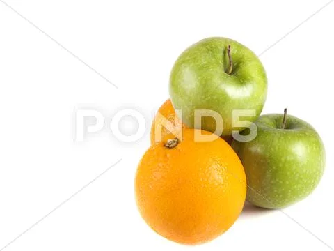 Fruit composition, green apples and oranges Stock Photos