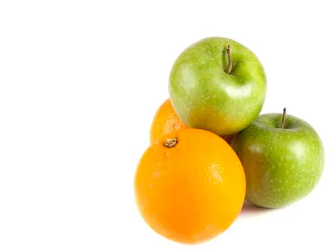 Fruit composition, green apples and oranges Stock Photos
