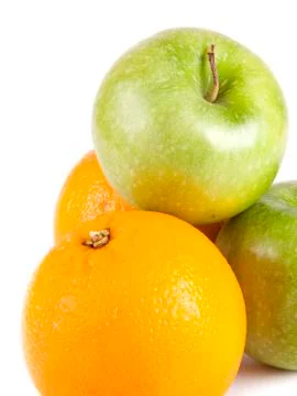 Fruit composition, green apples and oranges Stock Photos