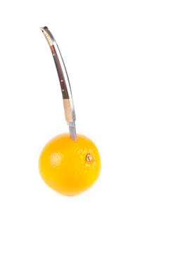 Fruit composition of orange and knife Stock Photos