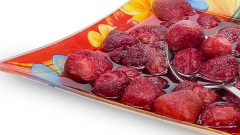 Fruit compote from a strawberry. Approaching, zooming. 4K 스톡 동영상 106674858