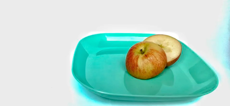 Fruit in a container ( apple ) Stock Photos