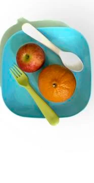 Fruit in a container ( orange apple ) Stock Photos