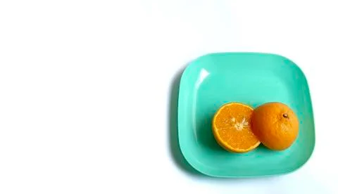 Fruit in a container ( orange ) Stock Photos