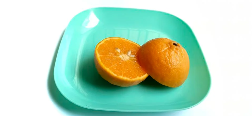 Fruit in a container ( orange ) Stock Photos