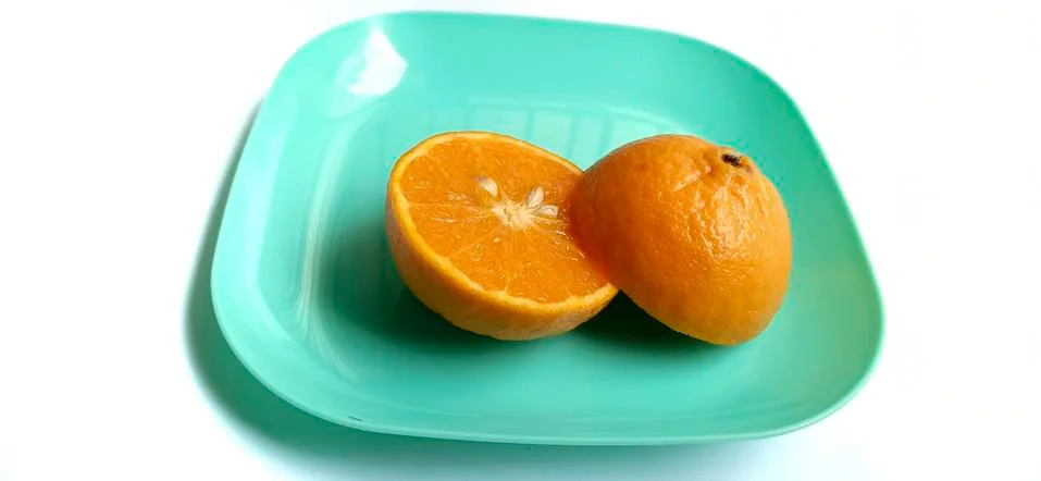 Fruit in a container ( orange ) Stock Photos
