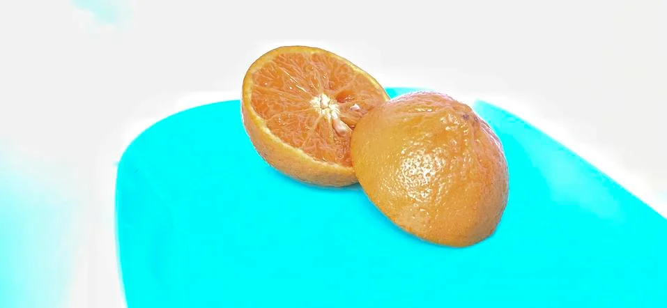 Fruit in a container ( orange ) Stock Photos