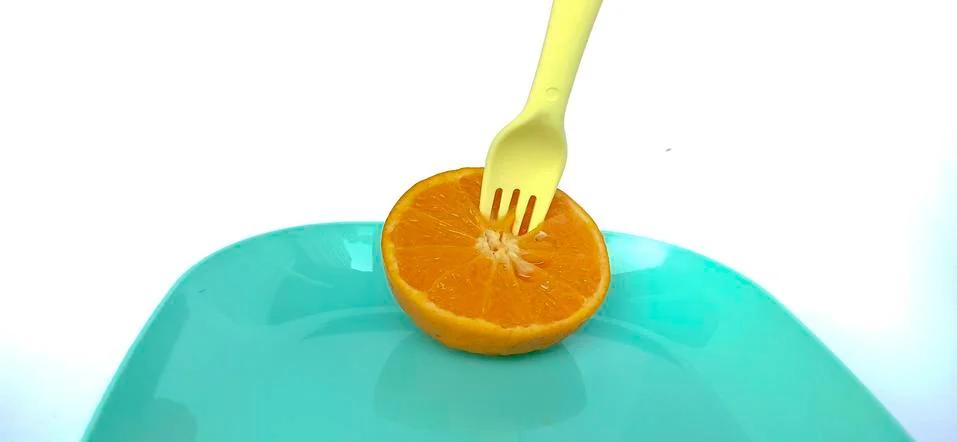 Fruit in a container ( orange ) Stock Photos