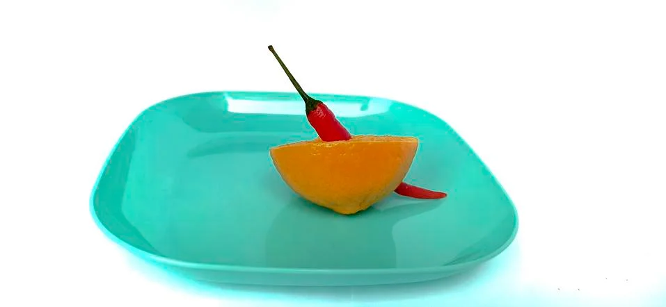 Fruit in a container (  pepper orange ) Stock Photos