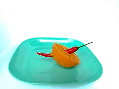 Fruit in a container (  pepper orange ) Stock Photos