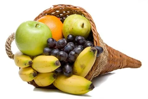 Fruit Cornucopia A cornucopia basket filled with delicious fresh fruit. Co... Stock Photos