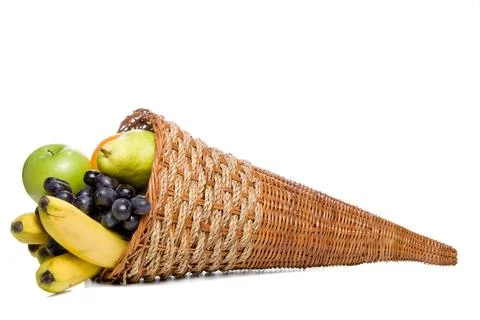 Fruit Cornucopia A cornucopia basket filled with delicious fresh fruit. Co... Stock Photos