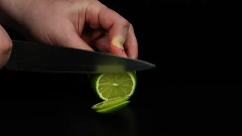 Fruit. Cut lime into slices Video stock 169617511