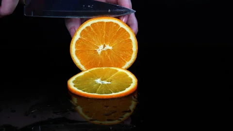 Fruit. Cut orange into slices Stock-Footage 169617046
