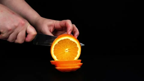 Fruit. Cut orange into slices Stock Footage 169617460