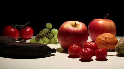 Fruit decomposition timelapse against black background, panning right Stock Footage 238891064