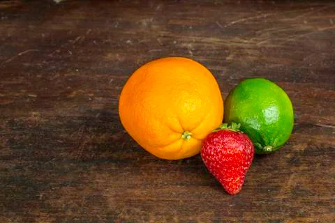 Fruit on a desk Stock Photos