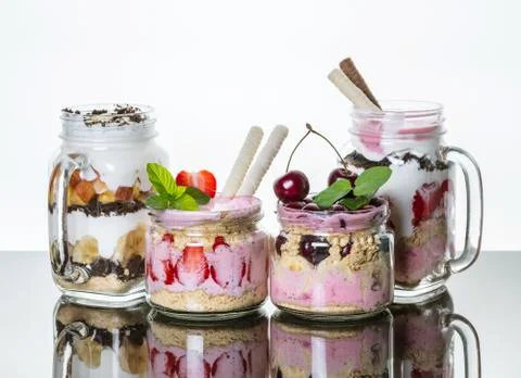 Fruit desserts in a jar with reflection Stock-Fotos