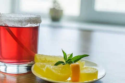 Fruit drink and fruit candy from a lemon. Stock Photos
