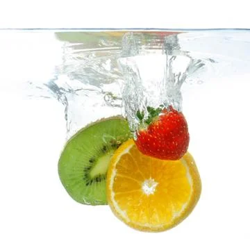 Fruit dropped in the water Foto stock
