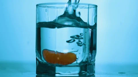 Fruit falling into glass. Slow motion Stock Footage 104845668