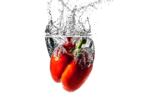 Fruit falling in water 스톡 사진
