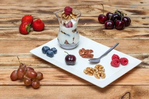 Fruit with flat cheese Stock Photos