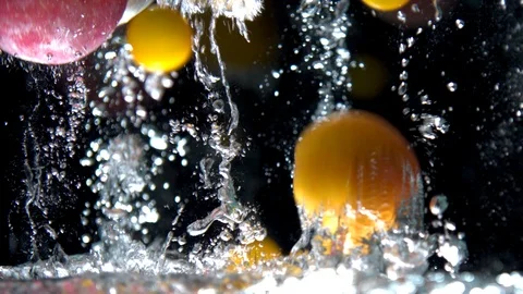Fruit flying in fresh water Stock Footage 112099367
