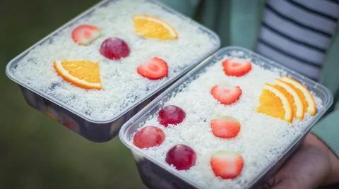Fruit fresh mixed tropical fruit salad. Bowl of healthy fresh fruit salad Stock Photos