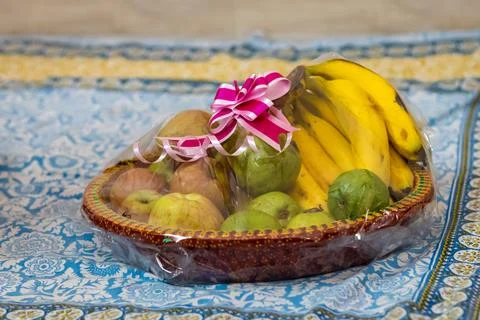 Fruit gift wrap filled with different fruits from different angle Stock-Fotos