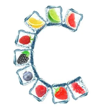 Fruit in the ice cube Stock Photos