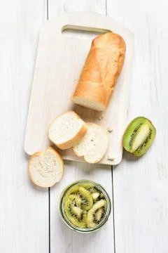 Fruit jam from kiwi and bread slices 스톡 사진