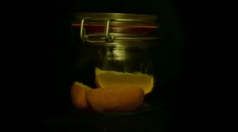Fruit jar orange slices with peel time lapse Stock Footage 10829997