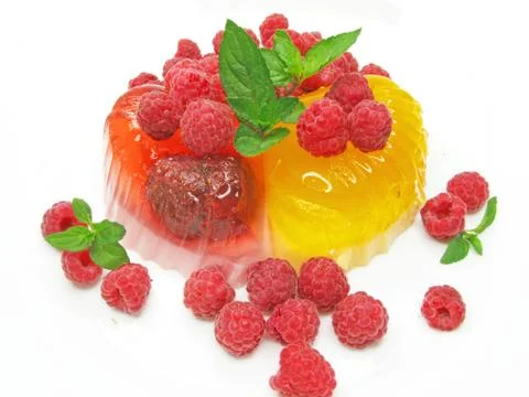 Fruit jelly dessert with fresh raspberry Stock Photos
