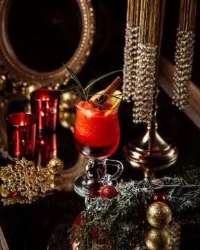 Fruit juice with lemon slice and cinnamon Stock Photos