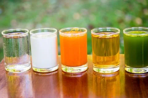 Fruit juices, orange juice, apple juice, kiwifruit juice,with milk and water  Stock Photos