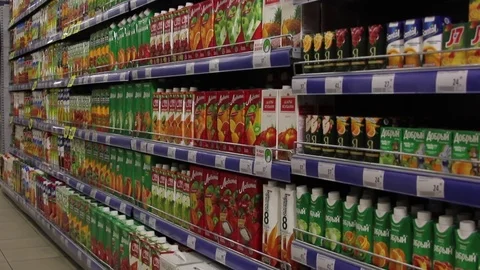 Fruit juices in the package, grocery store Stock Footage 75256730
