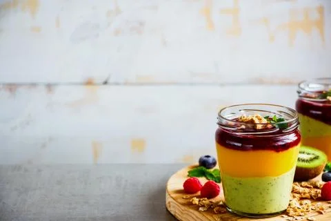 Fruit layered smoothie Stock Photos