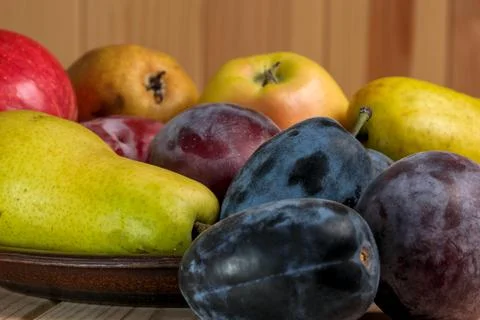Fruit layout on a wooden table Stock Photos